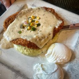 The Farmhouse signature dishes Biscuits & Gravy
Country Fried Steak
Berry Parfait